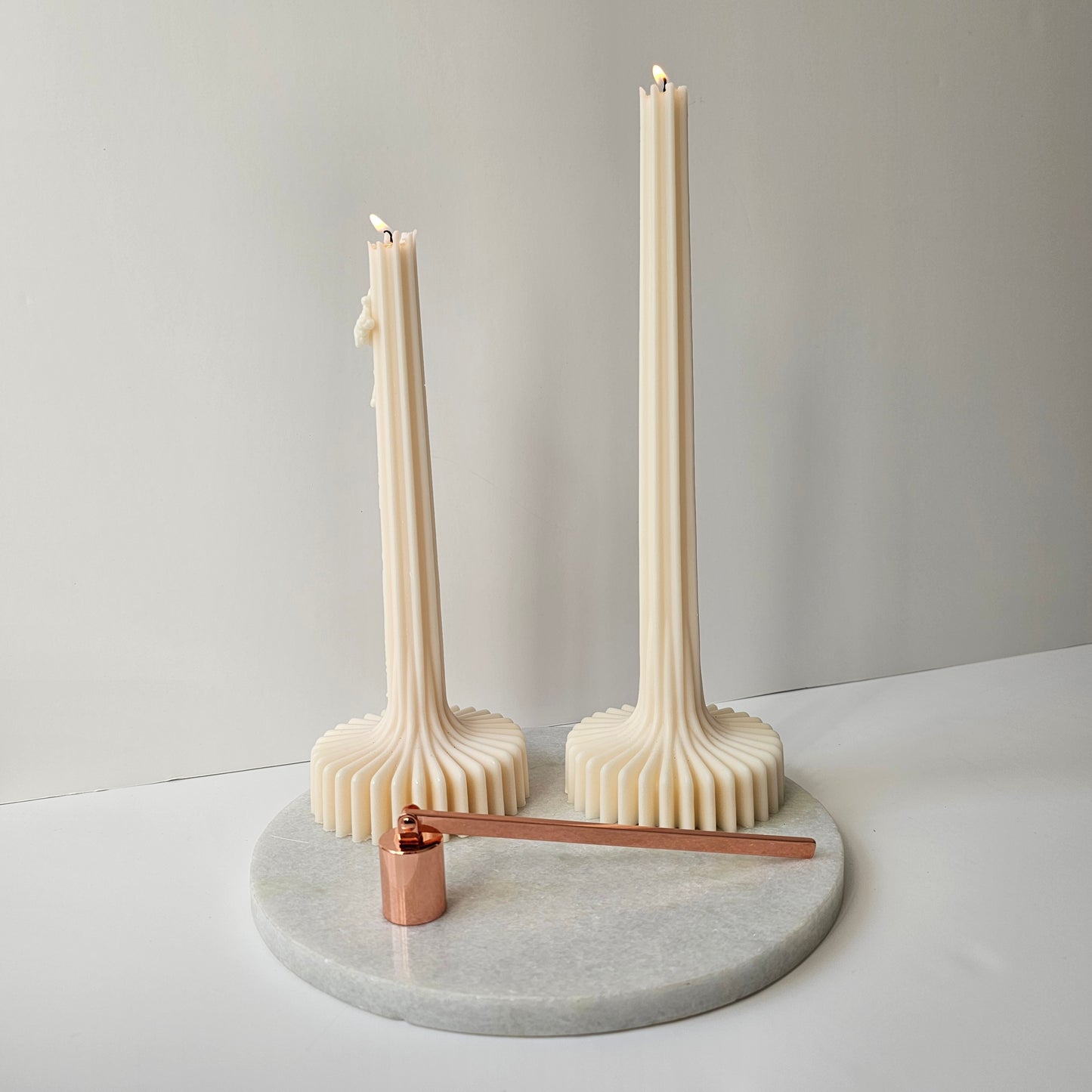 Rose gold candle snuffer