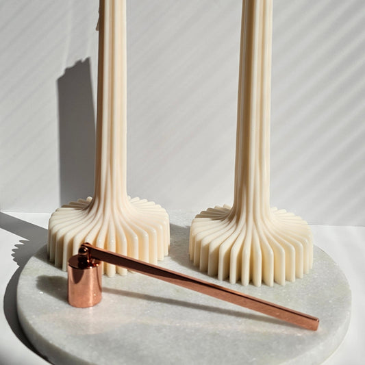Rose gold candle snuffer
